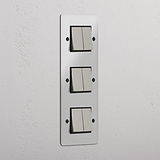 Vertical Six-Position Triple Rocker Switch in Clear Polished Nickel Black - Advanced Lighting Solution