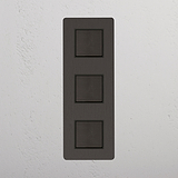 Bronze Black Triple Vertical Rocker Switch - Modern Tool for Light Management on White Background