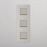 Vertical Triple Rocker Switch in Polished Nickel White on White Background