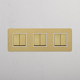 High-Capacity Triple Rocker Switch in Antique Brass White for Modern Living on White Background