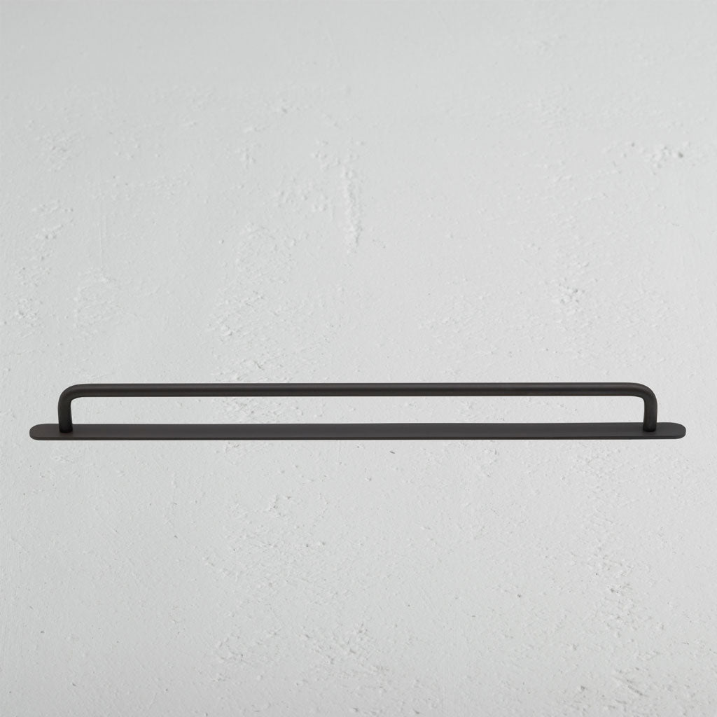 Bronze Kilburn Furniture Handle on White Background