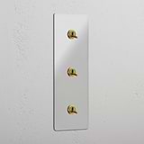 Vertical Triple Toggle Switch in Clear Antique Brass - User-friendly Light Control Tool