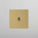 Intermediate Single Toggle Switch in Antique Brass, Versatile Design on White Background