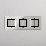 Diverse Six-Position Triple Rocker Switch in Clear Polished Nickel Black - Multifunctional Lighting Solution on White Background