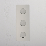 High Capacity Vertical Light Intensity Control Switch: Polished Nickel Triple 3x Vertical Dimmer Switch on White Background