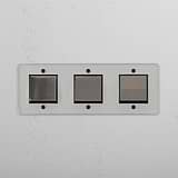 Comprehensive Triple Rocker Switch in Clear Polished Nickel Black - Advanced Light Control Tool on White Background
