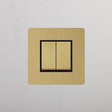 Double Rocker Switch in Antique Brass Black, Single Set on White Background