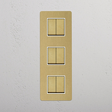 Versatile Triple Vertical Rocker Switch in Antique Brass White for Easy Operation on White Background