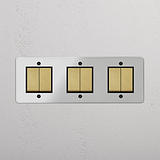 Six-Position Triple Rocker Switch in Clear Antique Brass Black - Comprehensive Lighting Accessory on White Background
