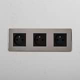 High Capacity French Standard Power Outlet: Polished Nickel Black Triple 3x French Power Module on White Background