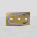 Triple Switch Plate in Antique Brass - Timeless European Home Accessory on White Background