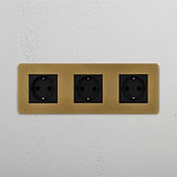 Antique Brass Black Triple Schuko Module with 3 Connections on White Background
