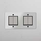 Comprehensive Four-Position Double Rocker Switch in Clear Polished Nickel Black for Light Management on White Background