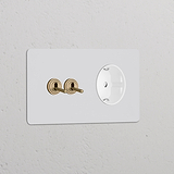 Doppio Interruttore a Levetta 2x + Modulo di Alimentazione Schuko Tipo F Tondo – Pitturabile Ottone Antico Bianco