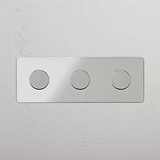 Dimmer Triplo Elegante in Nichel Lucido Trasparente - Accessorio Luminoso Regolabile su Sfondo Bianco