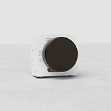 Bronzo Interruttore Dimmer Multidirezionale EU modulo: dimmer con grande manopola rotonda su superficie chiara.
