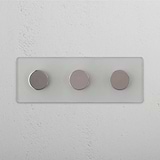 Dimmer Triplo Elegante in Nichel Lucido Trasparente - Accessorio Luminoso Regolabile su Sfondo Bianco
