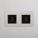 Modulo Doppio 2 prese Schuko/Bipasso nero lucido con doppia uscita e finitura nichel.