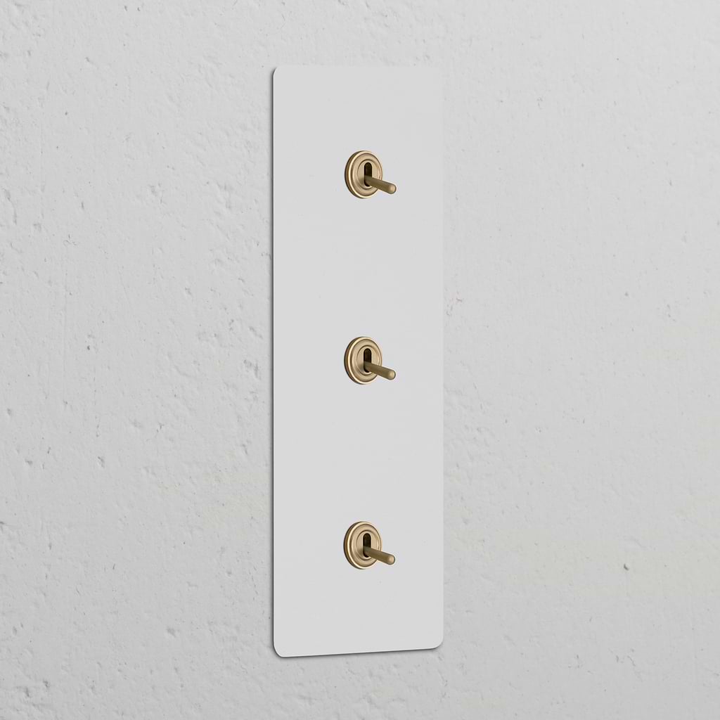 Interruttore a Levetta Triplo Verticale 3x – Pitturabile Ottone Antico