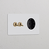 Doppio Interruttore a Levetta 2x & Modulo Schuko Tipo F Tondo in pitturabile ottone antico nero su placca bianca.