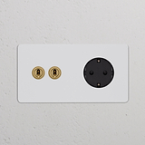 Doppio interruttore a levetta con modulo Schuko Tipo F, ottone antico nero, per prese e moduli doppi.