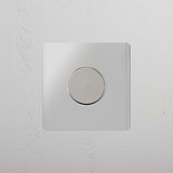 Dimmer Singolo Elegante in Nichel Lucido Trasparente - Sistema di Controllo Luce Premium su Sfondo Bianco
