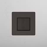 Interruttore a Bilanciere Intermedio in Bronzo Nero su Sfondo Bianco