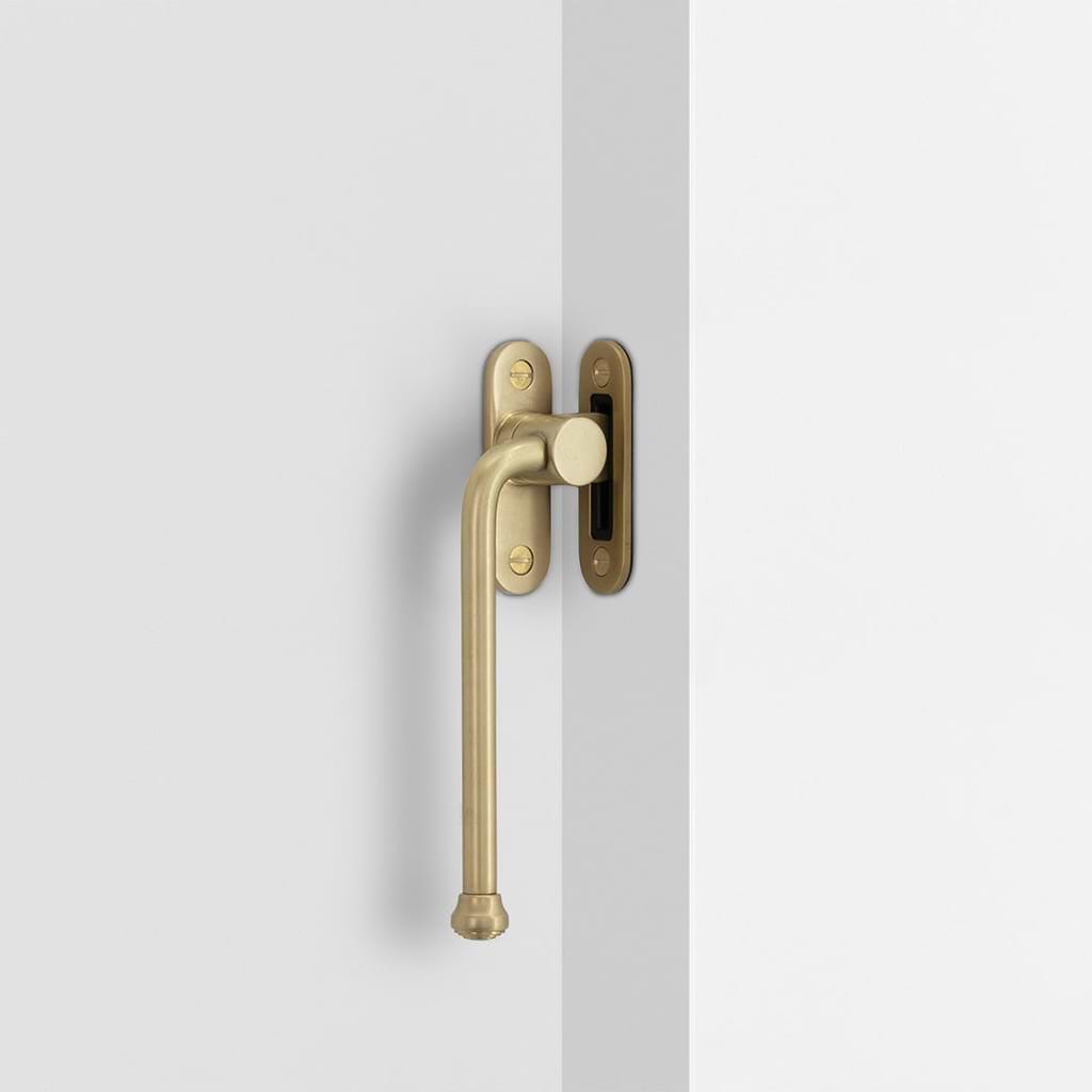 Southbank Casement Window Handle With Plate Left – Antique Brass
