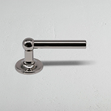 Polished Nickel Harper Sprung Door Handle on White Background