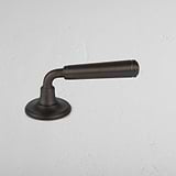 Bronze Digby Sprung Handle on White Background