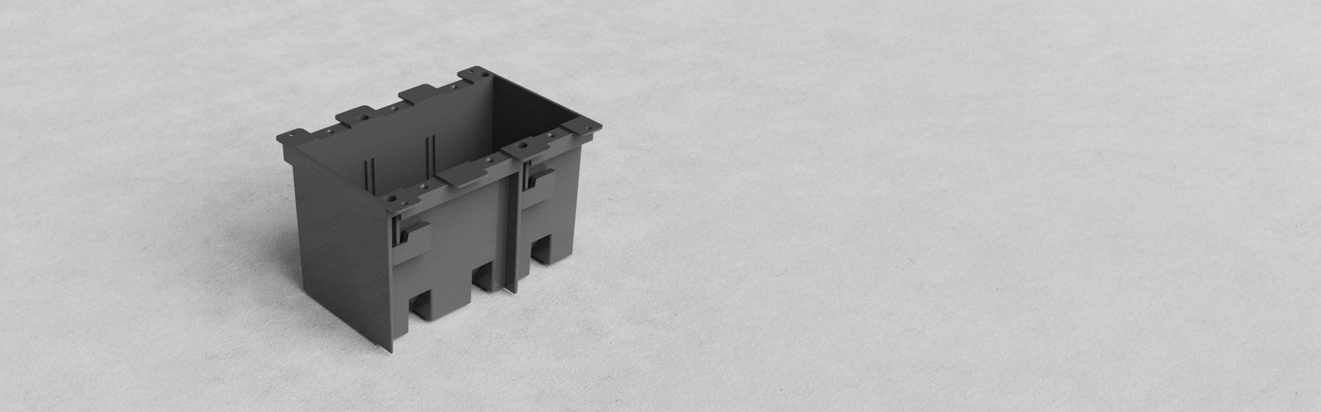 Black rectangular plastic container with open top, featuring side slots and connectors for stacking or joining with other units.