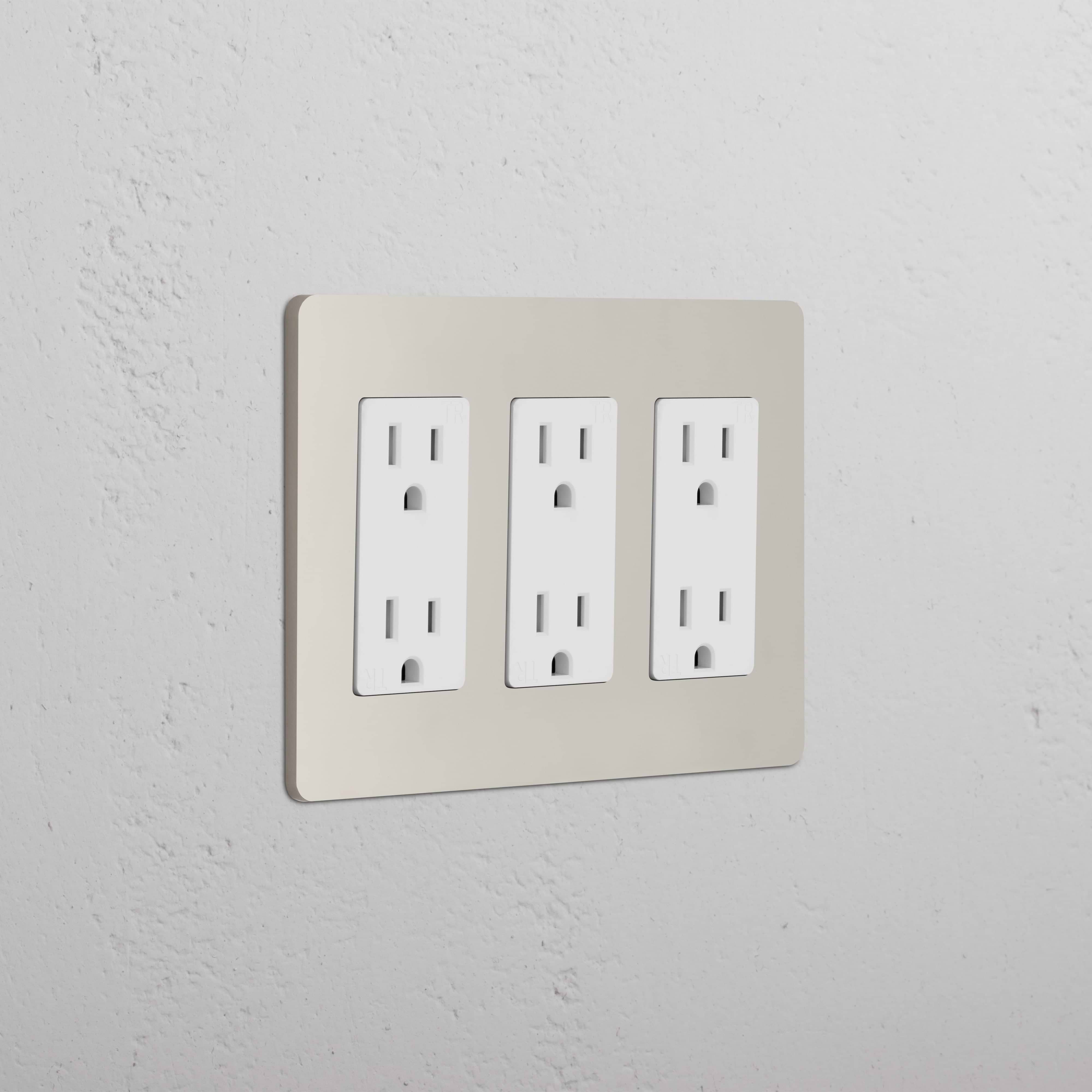 Grove 3G Outlet in polished nickel with a white cover plate, shown mounted on a white textured wall.
