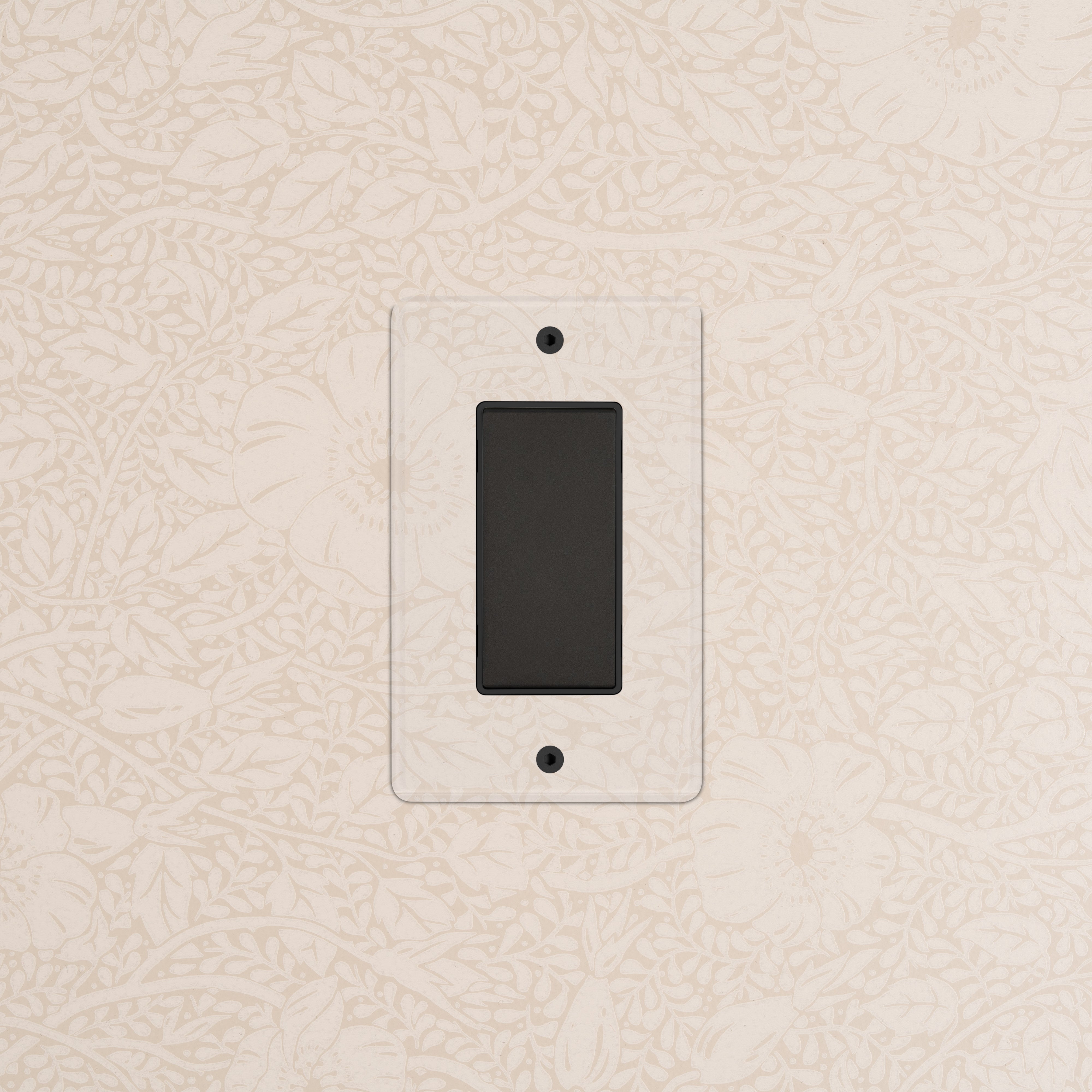Kew 1G Center Retractive Rocker Switch, black with clear bronze cover plate, installed on patterned wall.