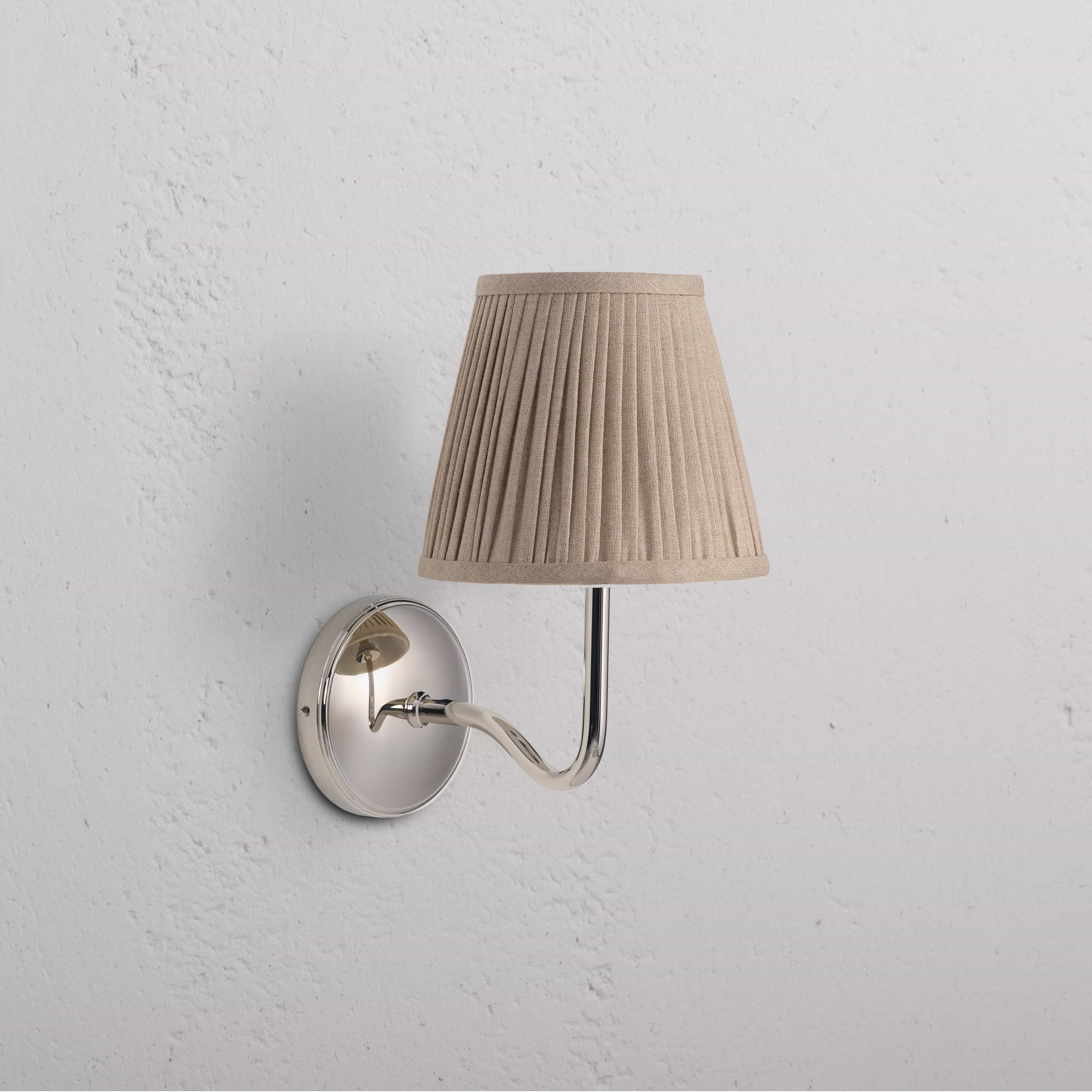 Malvern Medium Wall Light in Natural Beige with polished nickel base and pleated fabric lampshade.
