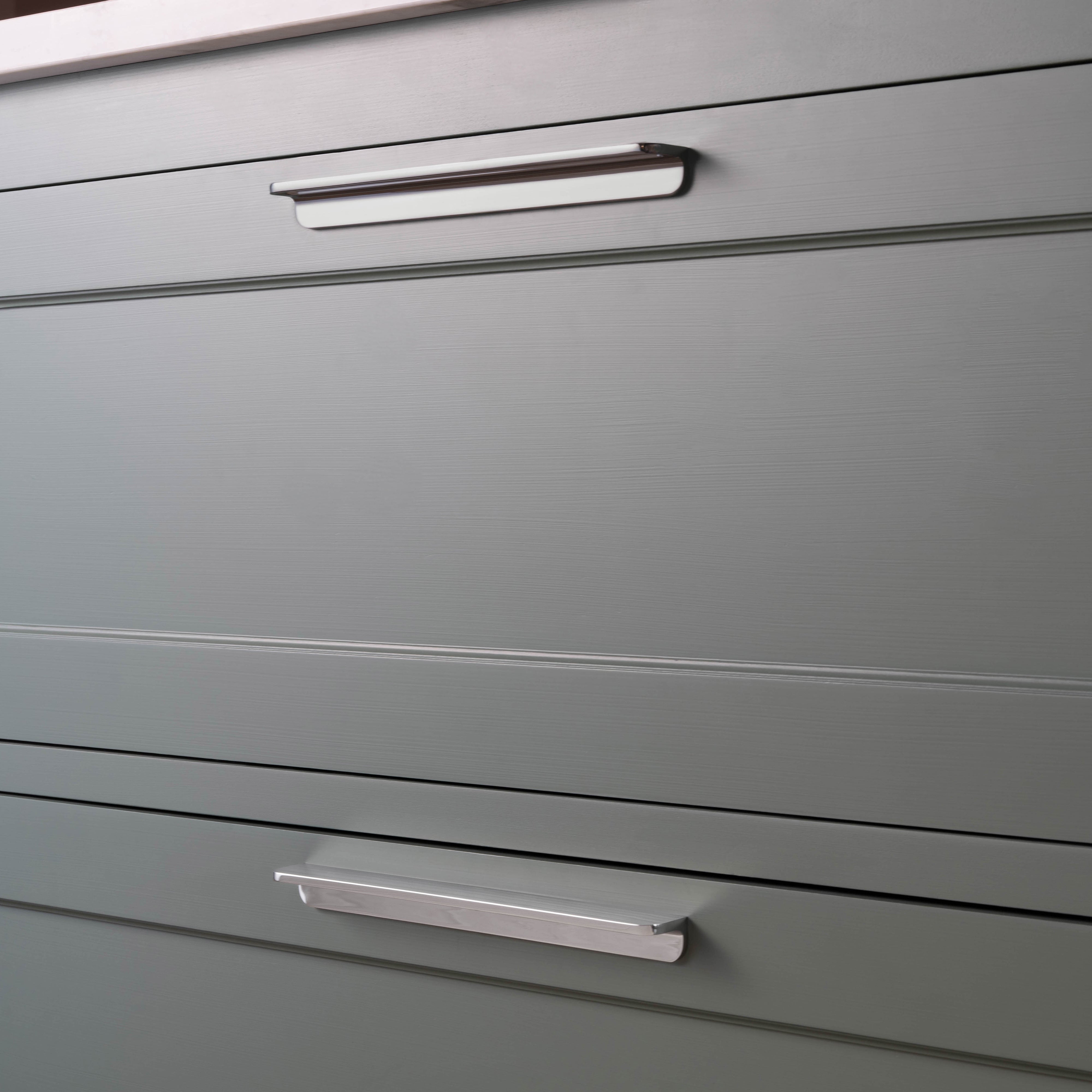 Close-up of two cabinet drawers fitted with Oxford Furniture Handle Large in polished nickel finish.