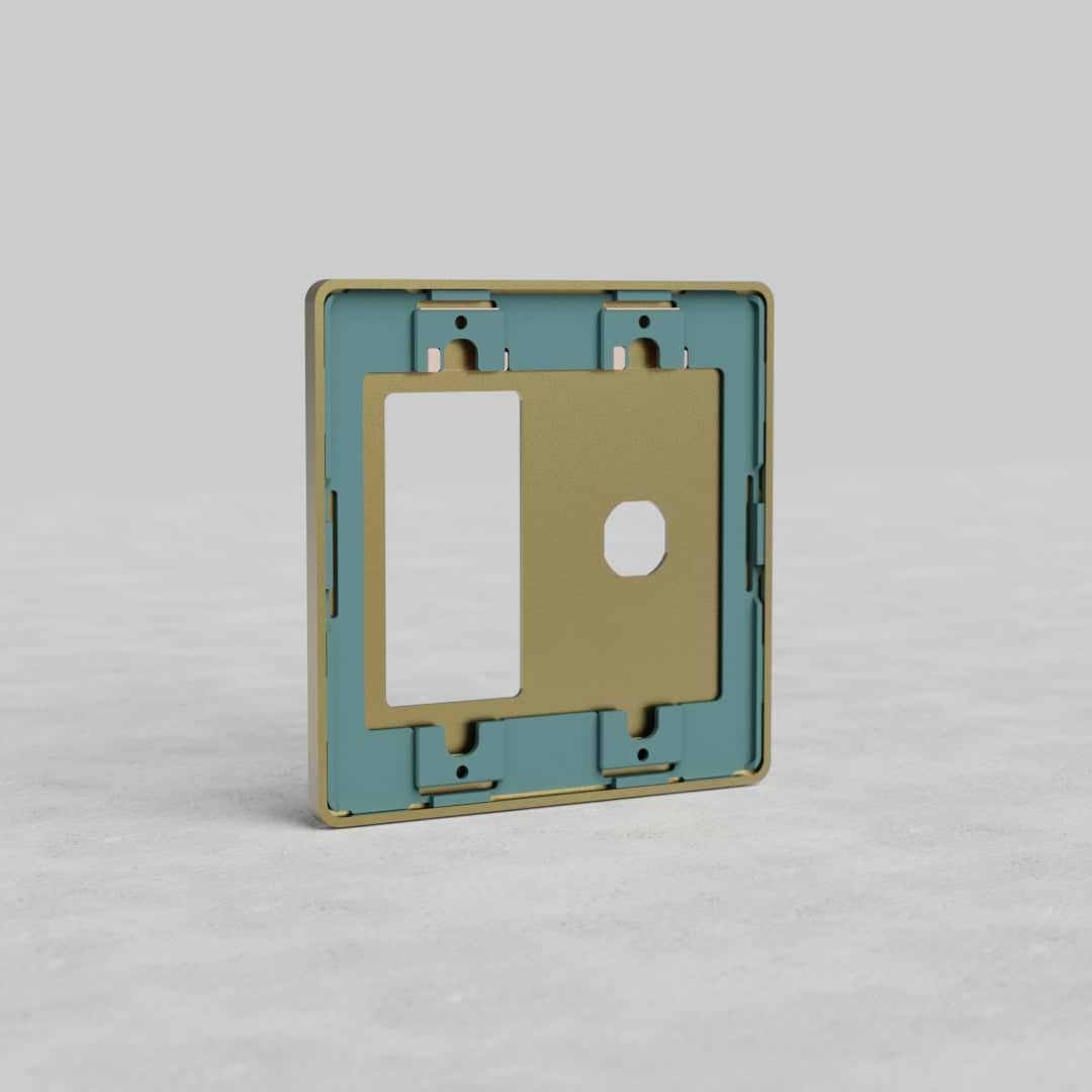 2G Switch & Outlet Plate Grove US in antique brass, with gold front and teal inner frame for switches and outlet.