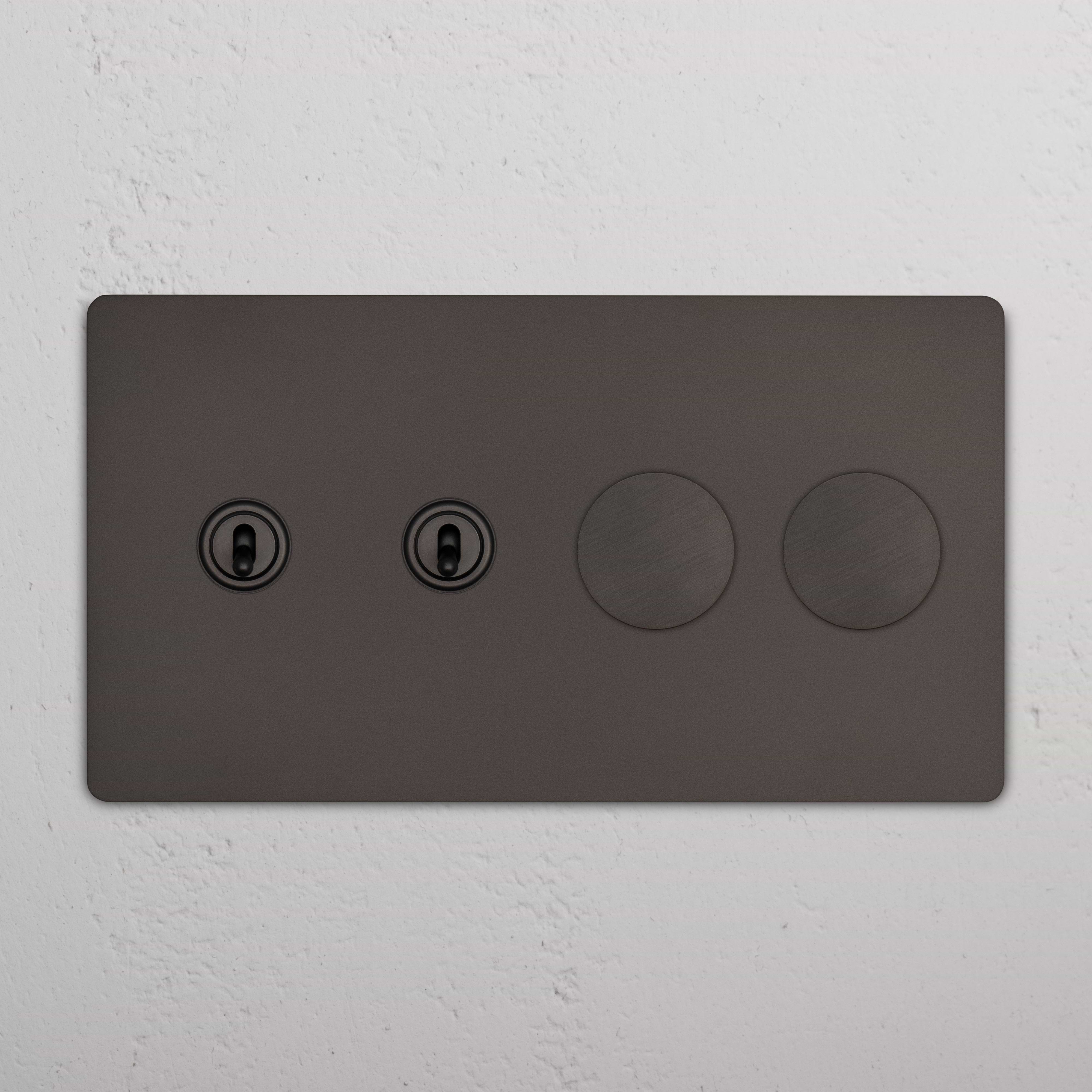 Grove 4G 2x Toggle & 2x Dimmer Switch in bronze with two toggle and two dimmer switches on a wall.