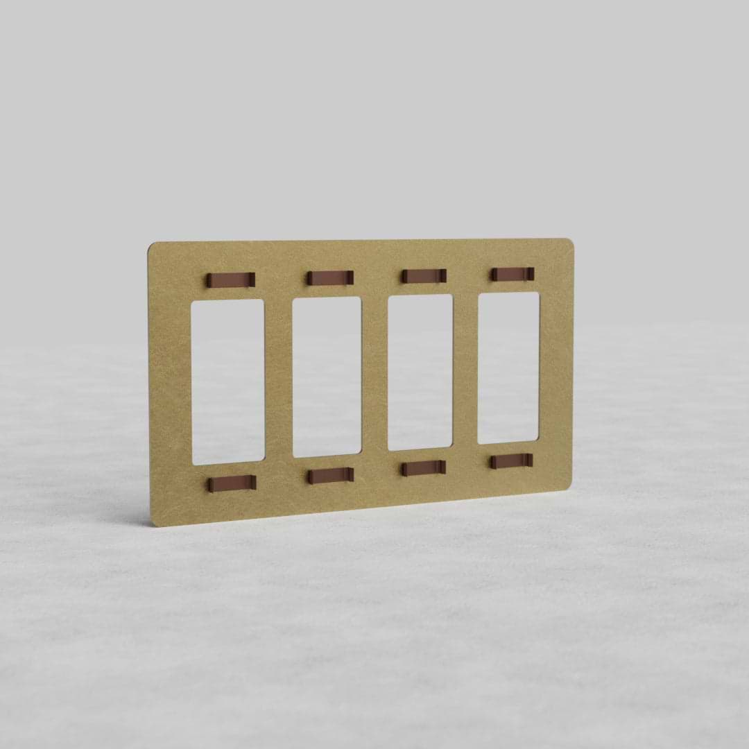 4G Outlet Plate Kew US in antique brass finish with four vertical rectangular openings, shown upright.