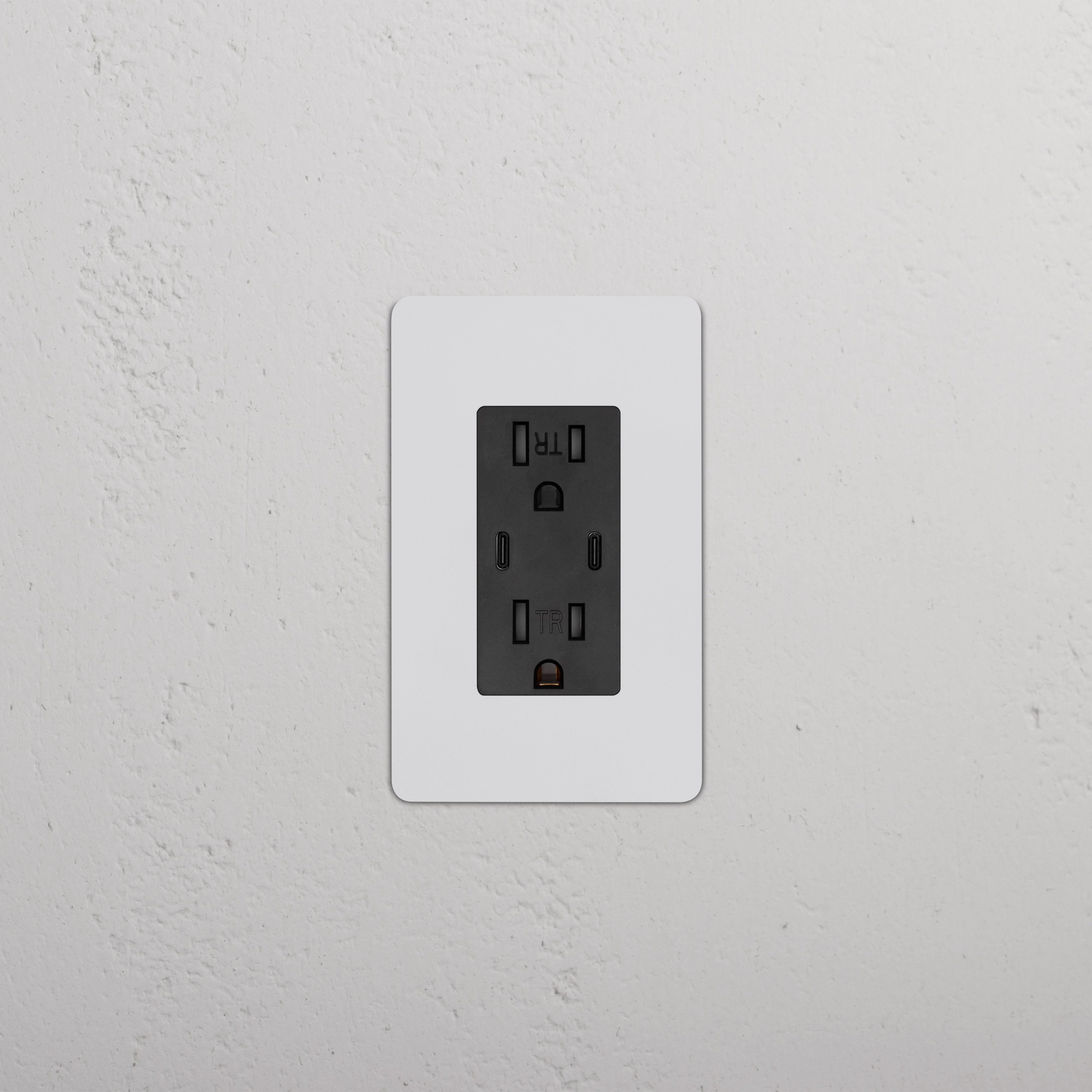 Kew 1G 15A USB Outlet with two sockets and a paintable black rectangular cover plate.