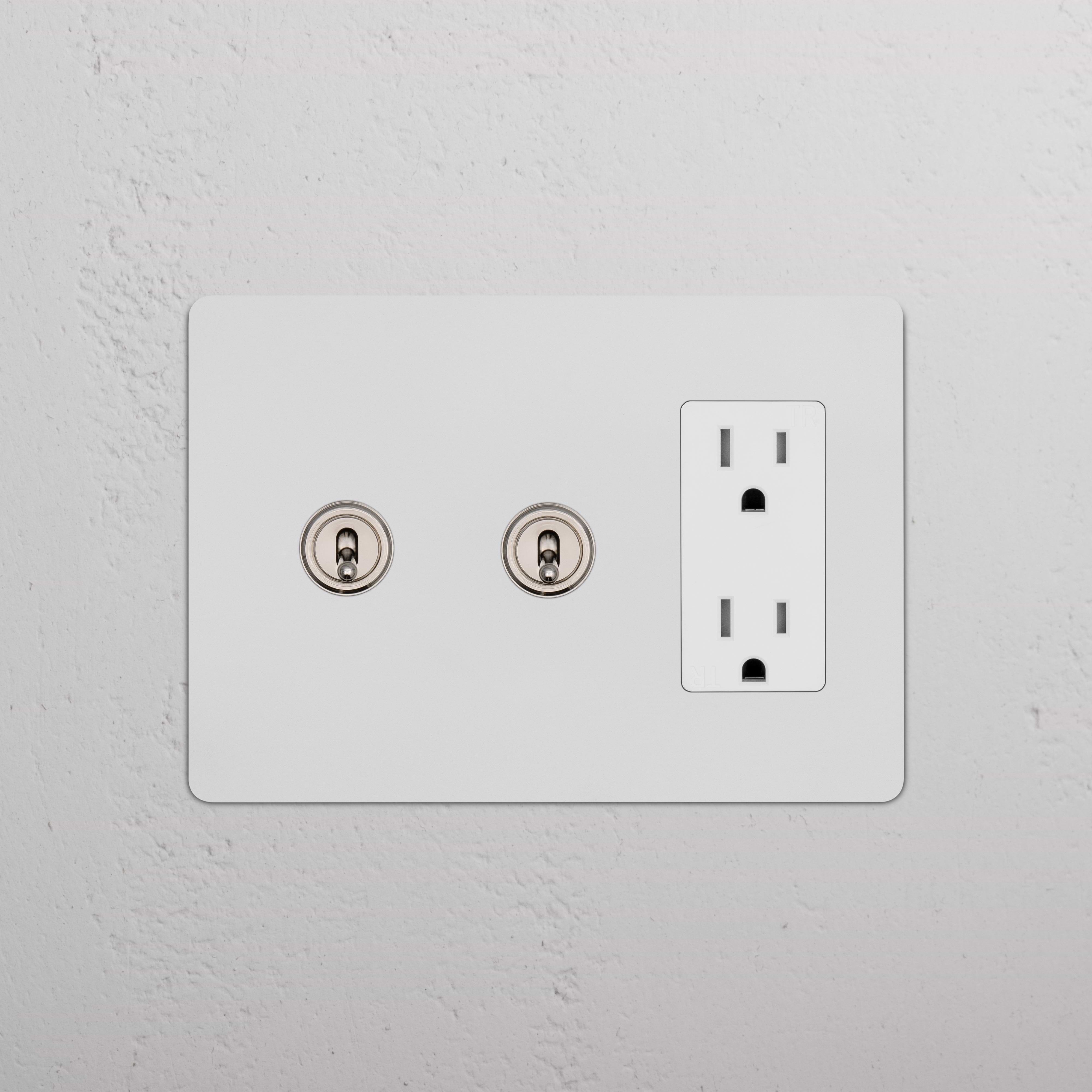 Kew 3G 2x Toggle Switch & Outlet in paintable polished nickel white, with two toggles and a standard outlet.