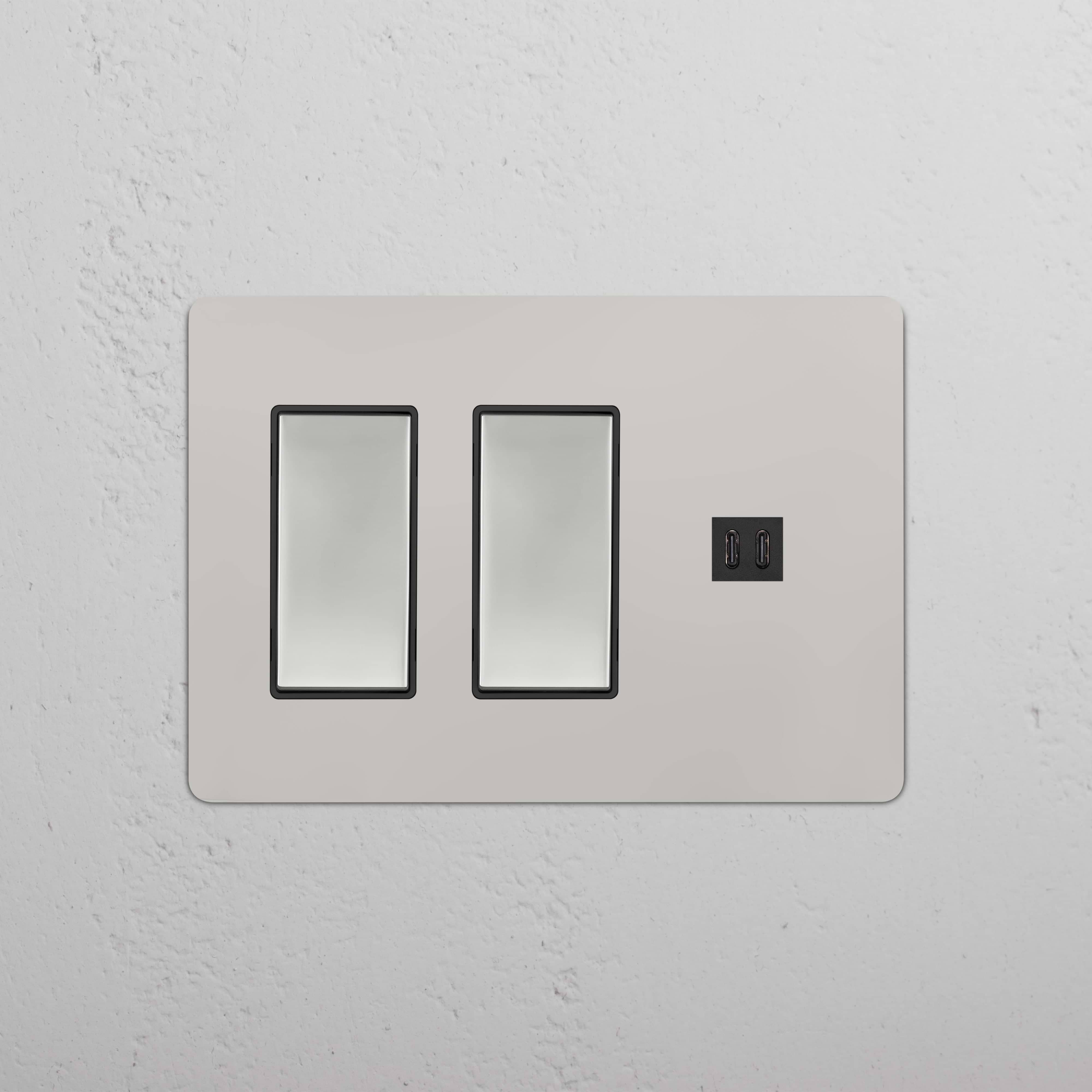 Kew 3G double rocker switch and fast charge USB outlet in polished nickel black, on a white wall.