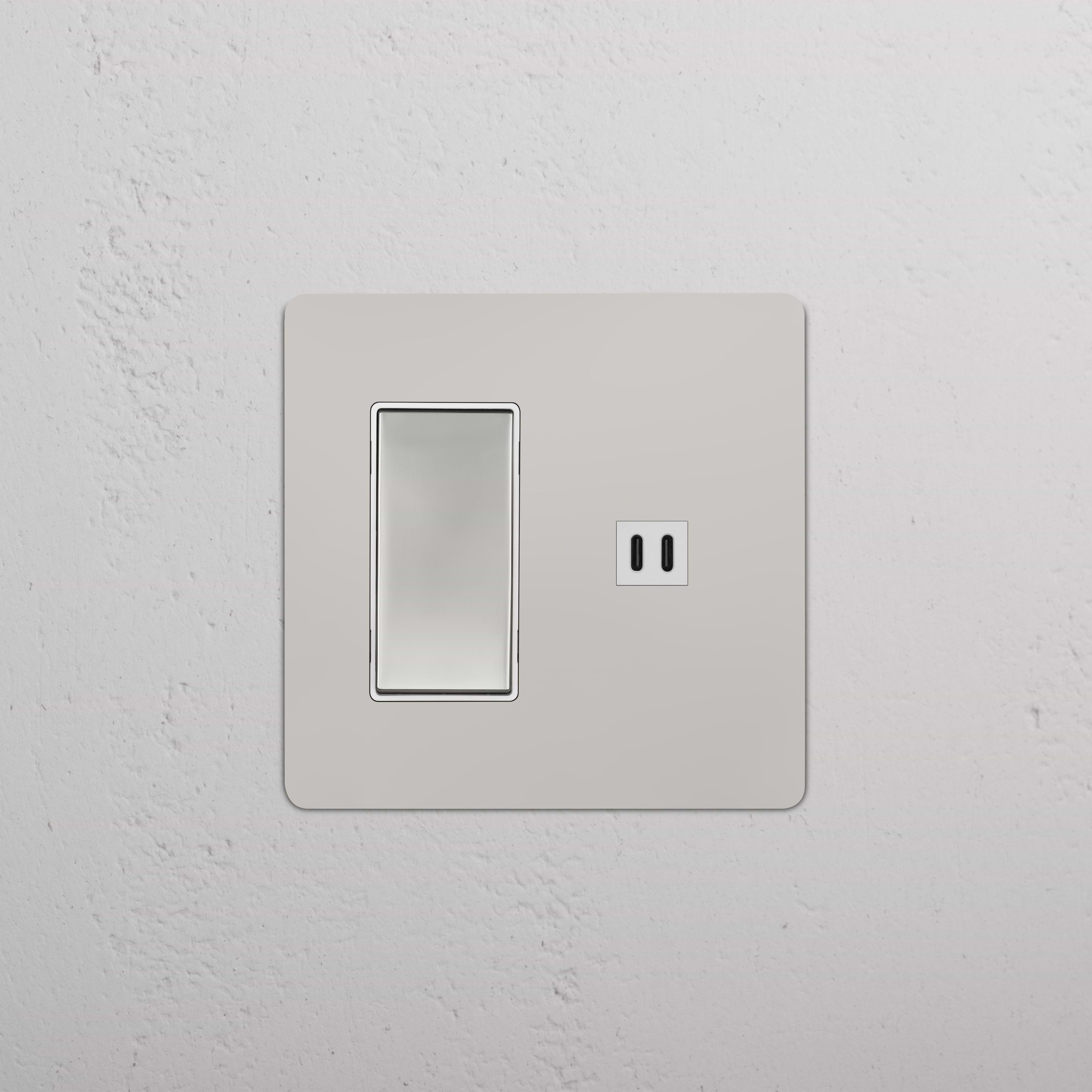 Kew 2G Rocker Switch & Fast Charge USB in polished nickel white finish on a white wall plate.