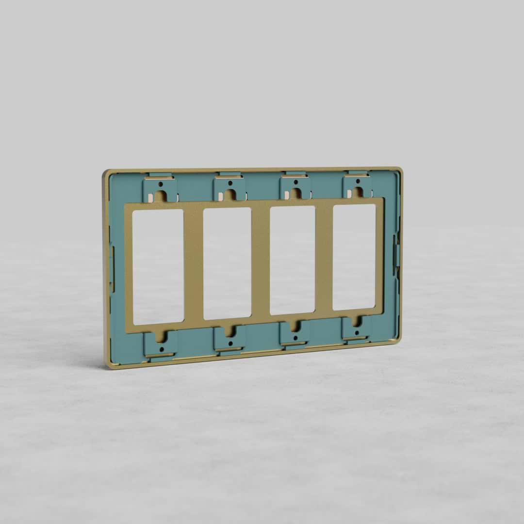 Rectangular 4G Outlet Plate Grove US in antique brass finish with four outlets, shown on a plain surface.