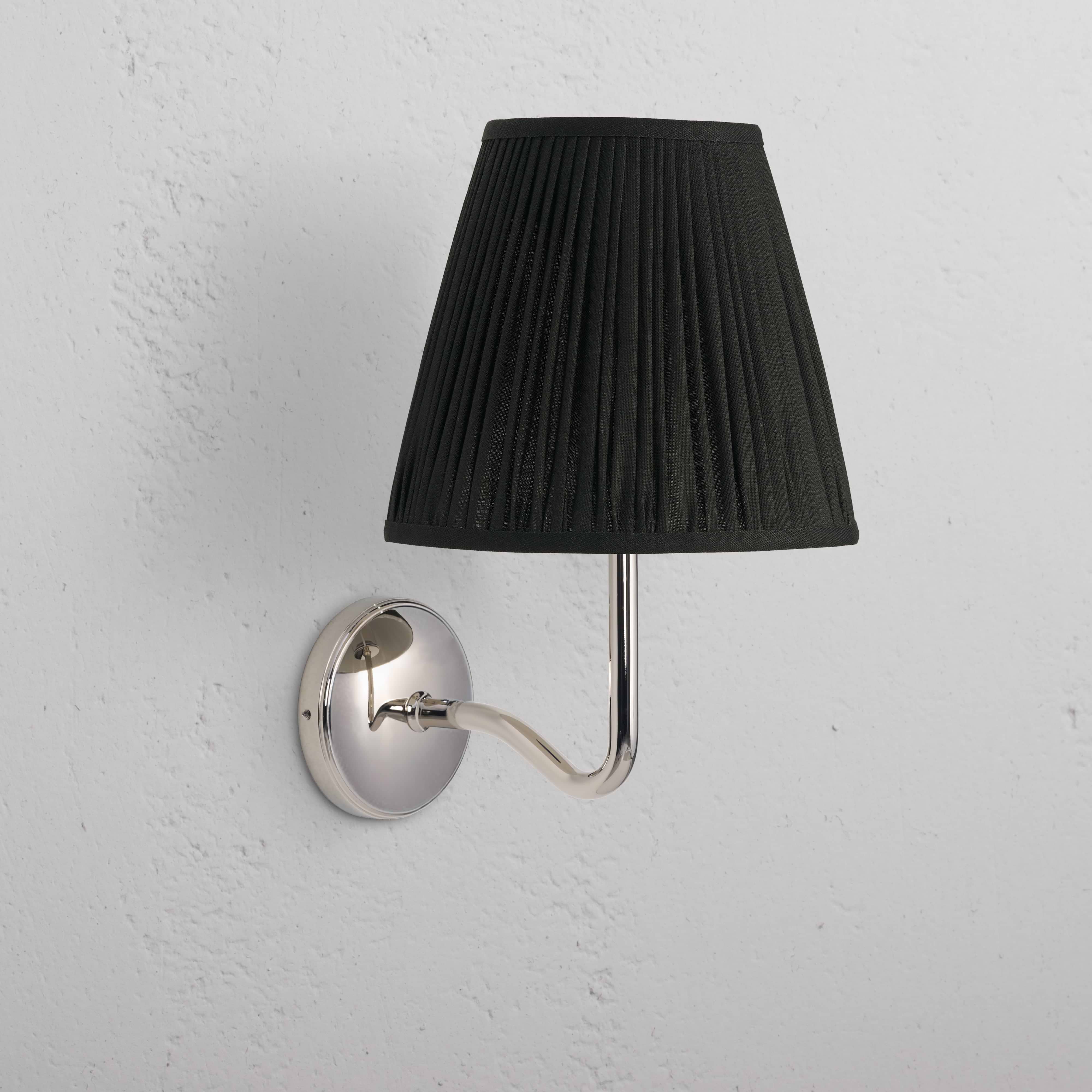 Large Malvern Wall Light in deep green with polished nickel finish, wall-mounted, on a white wall.