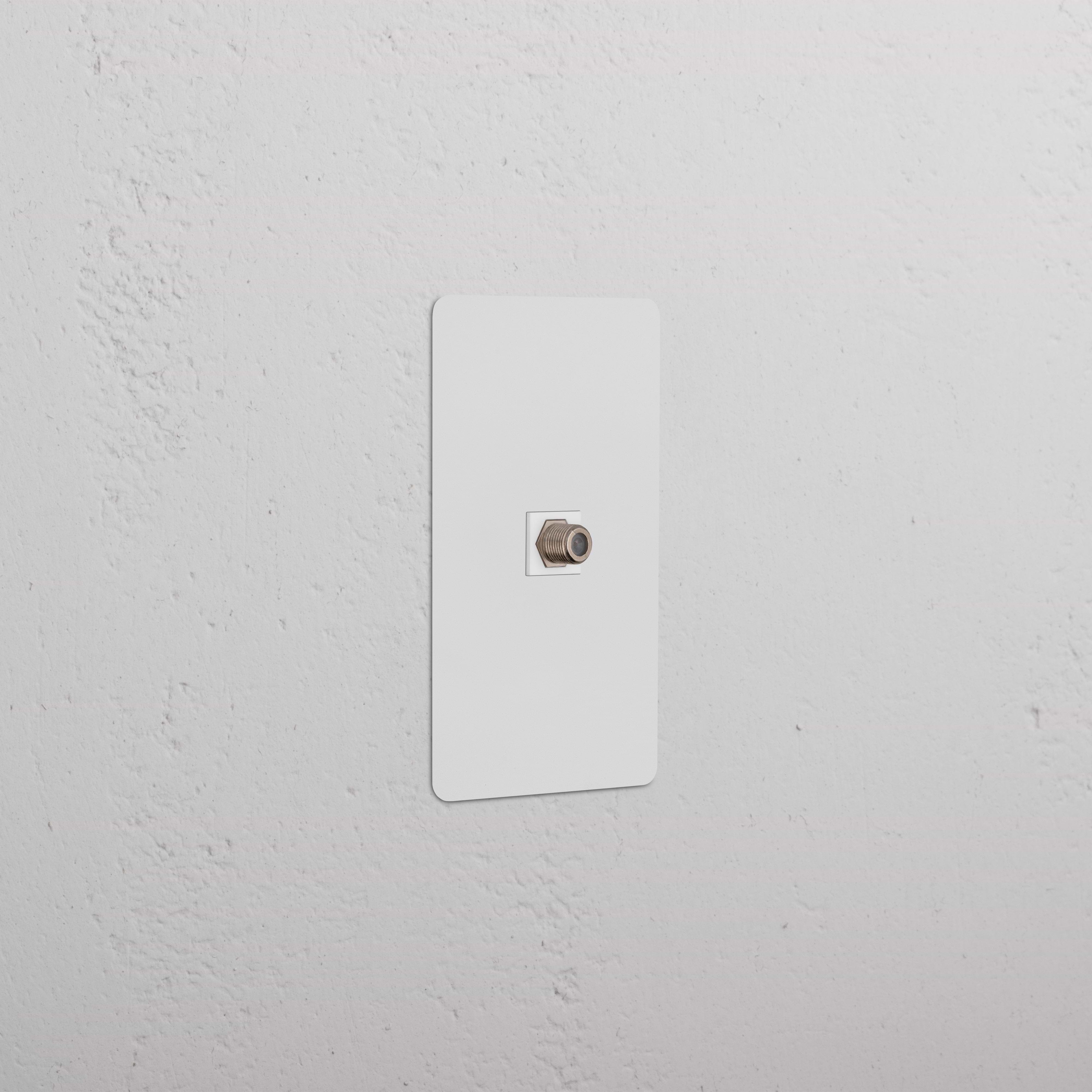 Kew 1G Satellite Keystone – a paintable white keystone wall plate with single satellite connector.