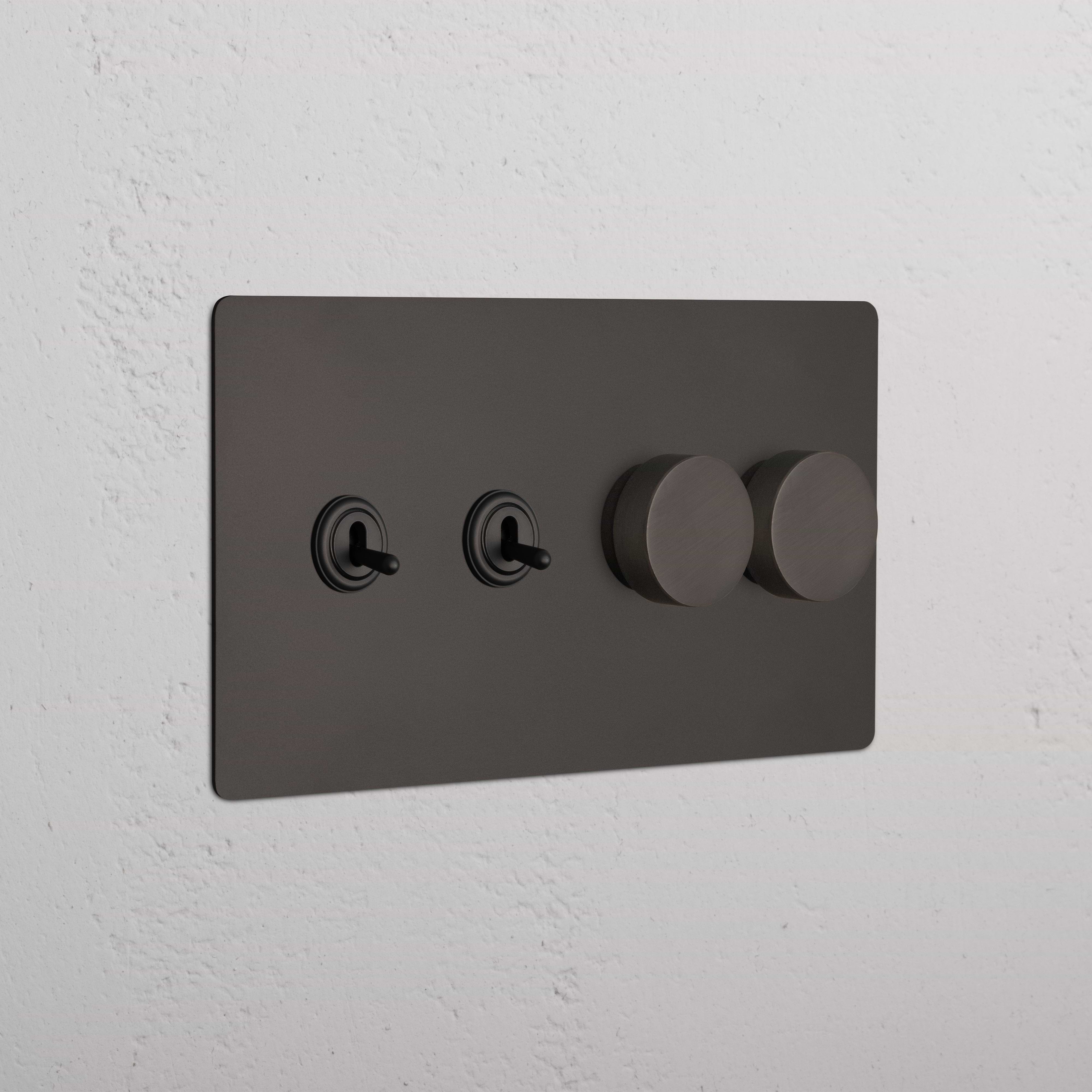 Bronze Kew 4G switch with two toggle switches and two dimmer knobs on a wall plate.