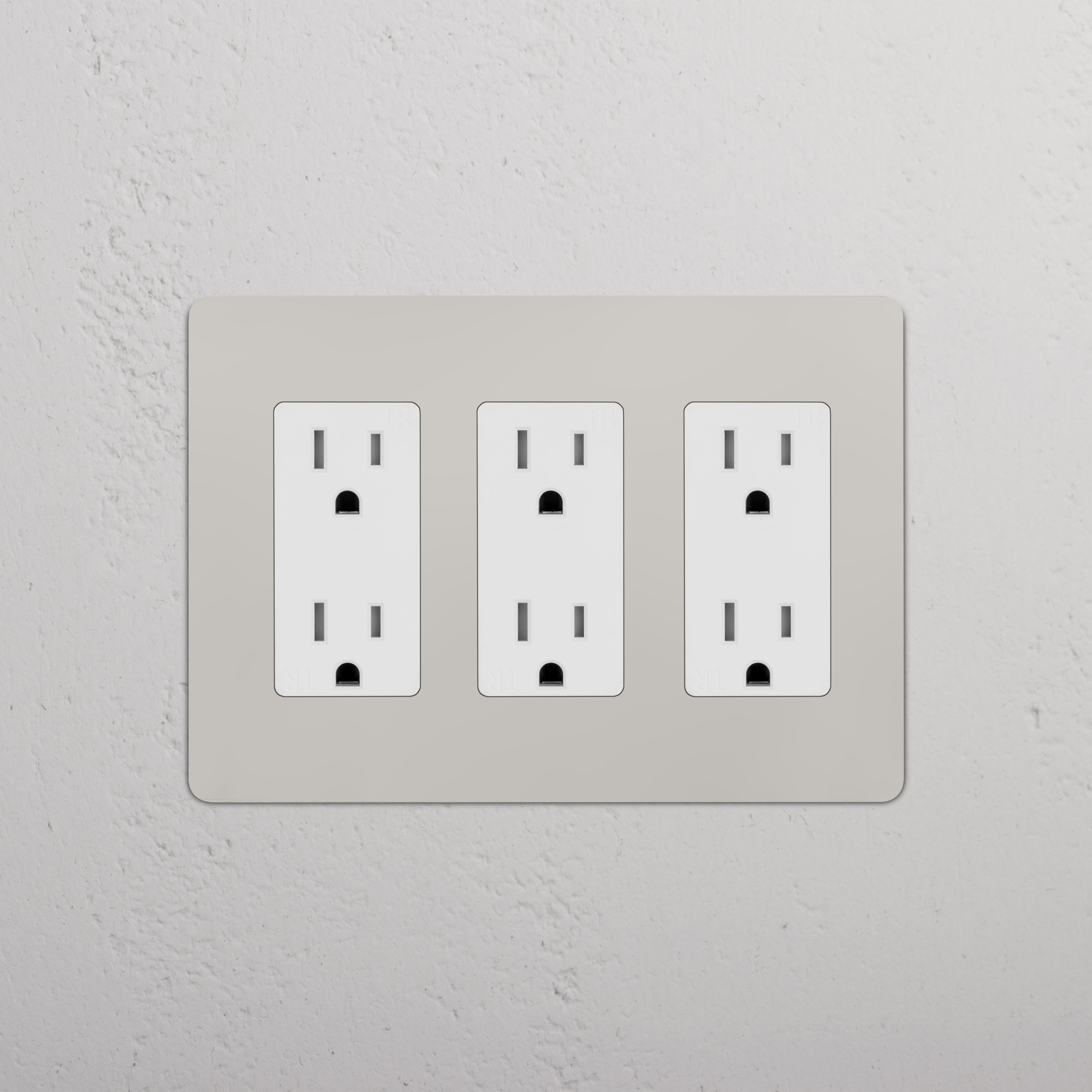 Kew 3G Outlet in Polished Nickel White, featuring three electrical outlets on a polished nickel plate.