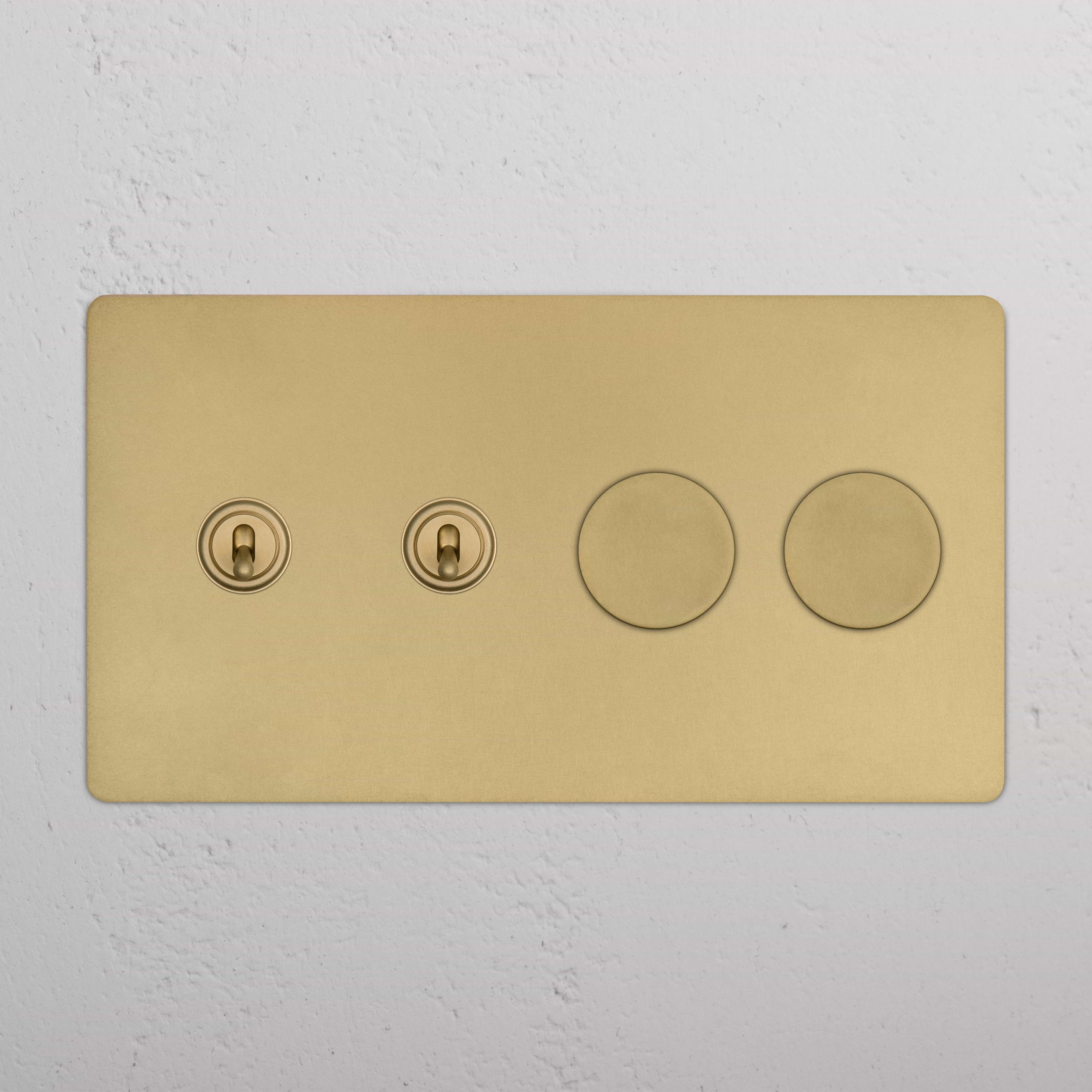 Kew 4G Antique Brass wall plate with 2 toggle switches and 2 dimmer knobs, for lighting control.