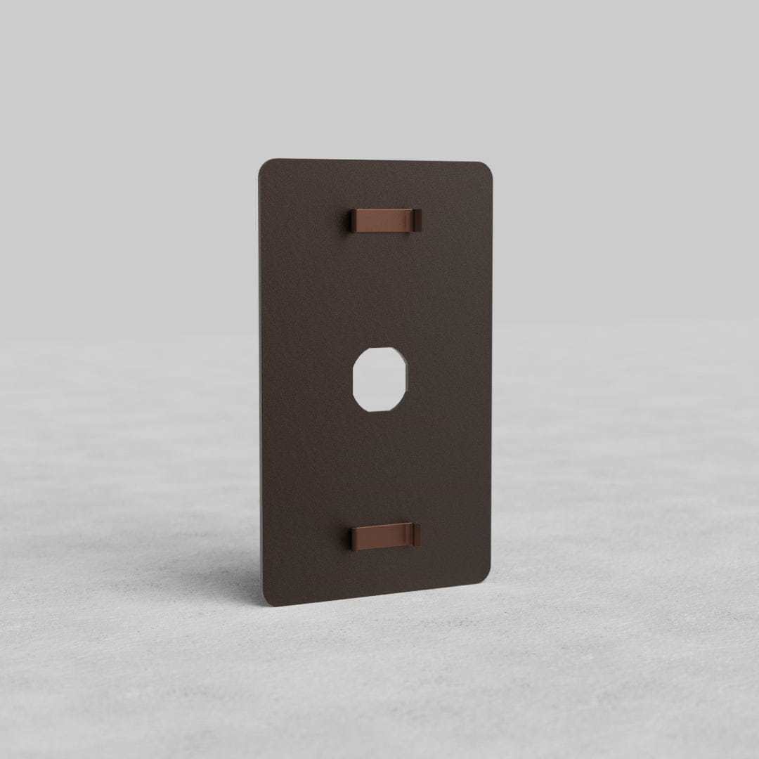 Rectangular bronze 1G Switch Plate Kew US with central hexagonal cutout, for single switch installation.