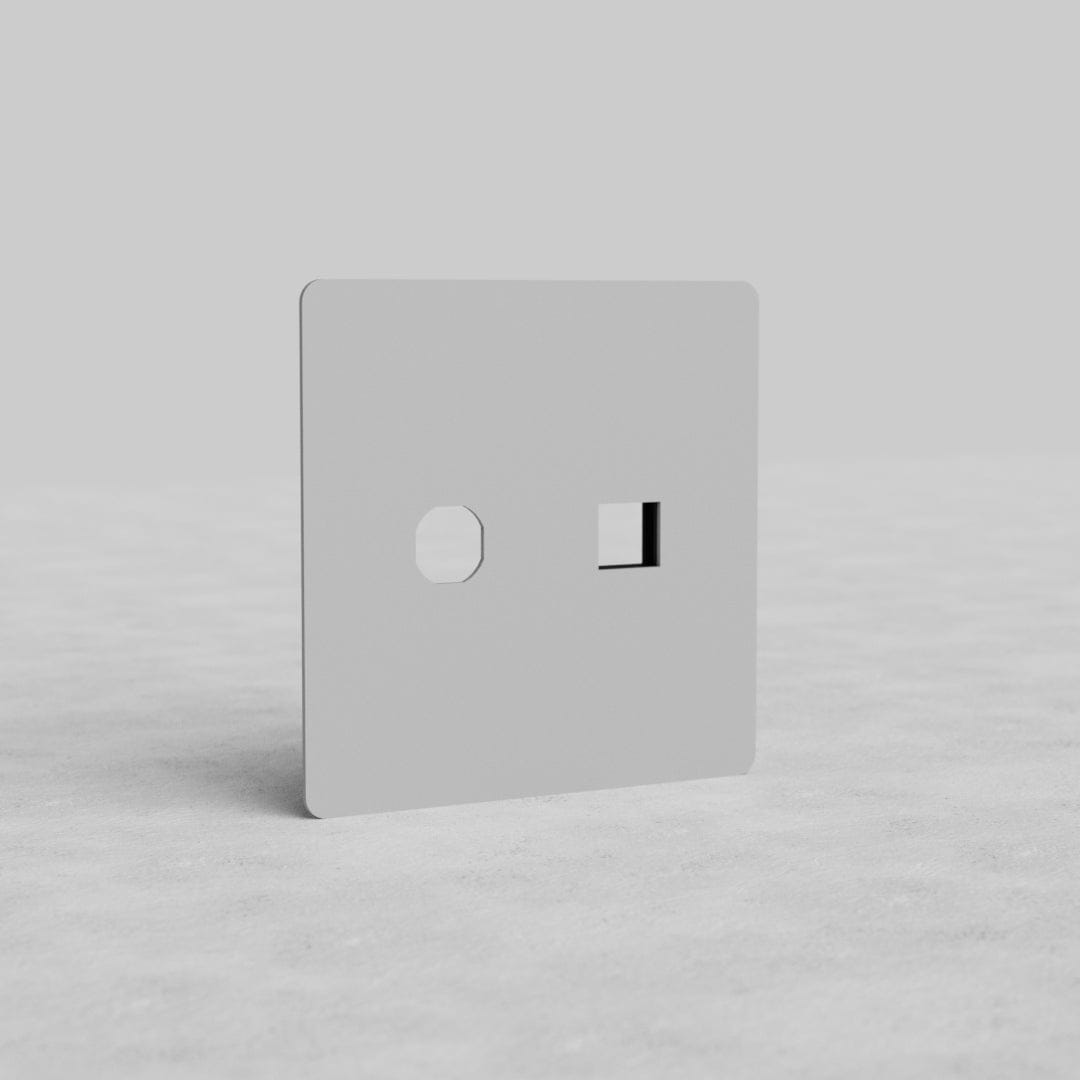 Paintable 2G switch and keystone plate (Kew US) with two cutouts, shown upright on a plain surface.